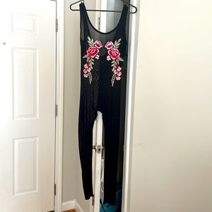 Night out see through black jumpsuit with flowers